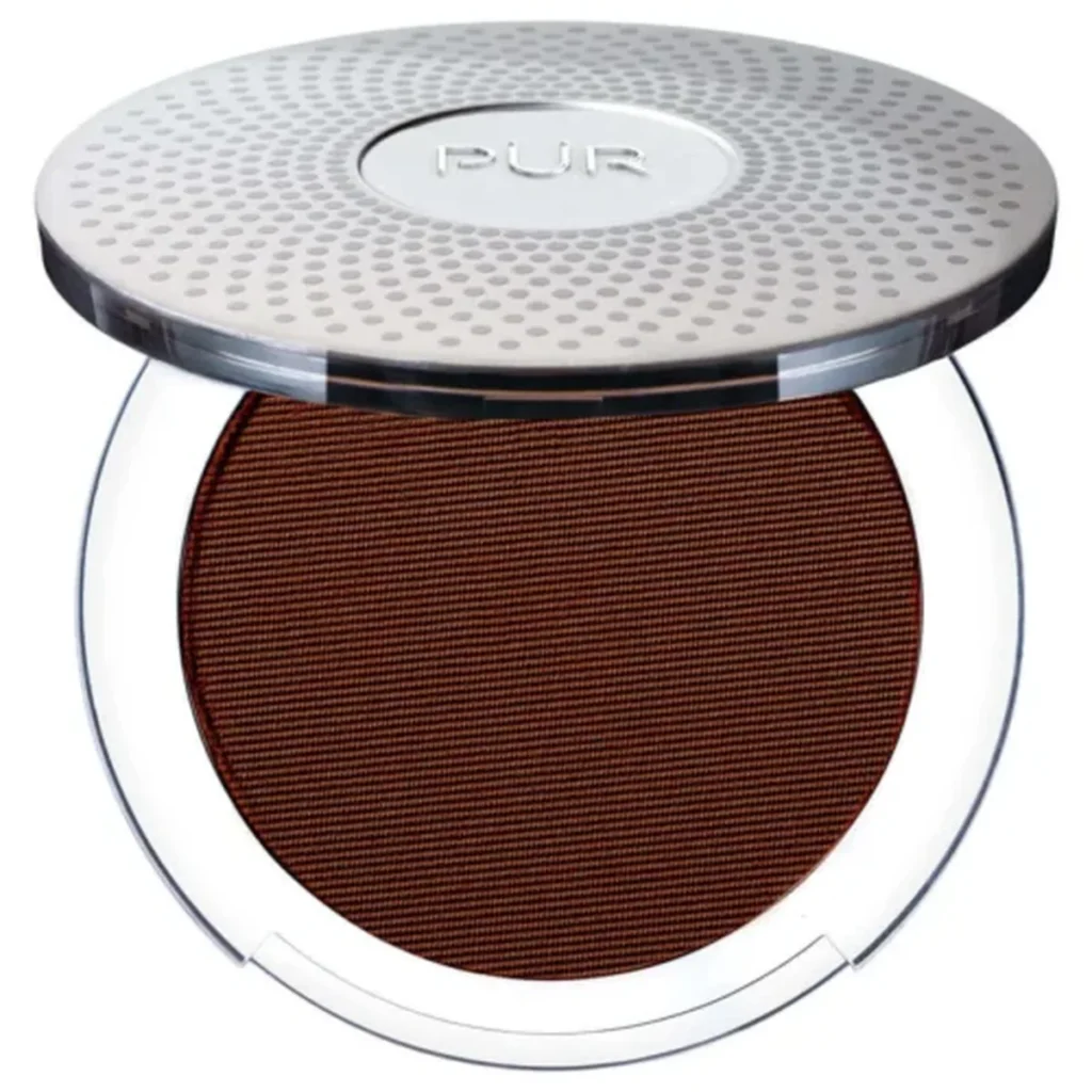 Five SPF foundations lined up on a travel vanity