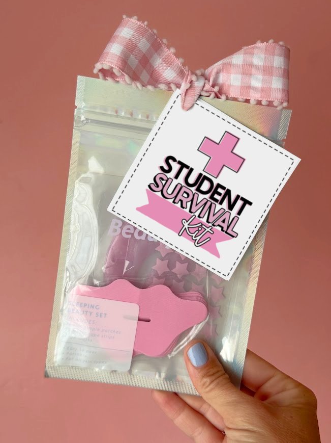Filled student survival kit tote bag with school supplies