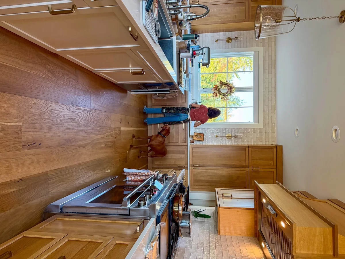 Cozy kitchen with fall colors visible through the window